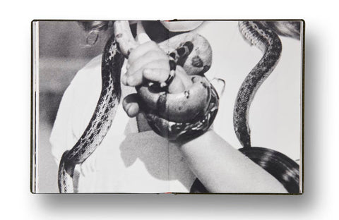 Girl Plays with Snake Clare Strand - MACK