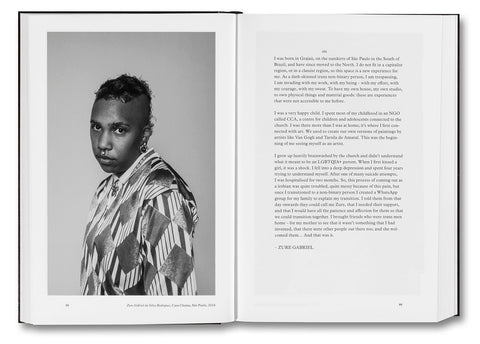 Open photography book "Faces and Phases" by MACK displaying black and white portrait images on glossy pages.