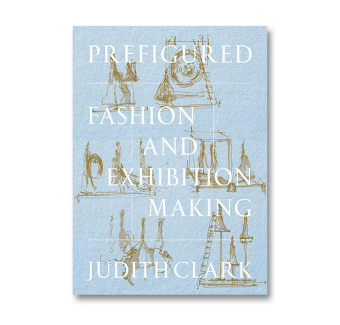 Book cover of 'Prefigured: Fashion and Exhibition Making' by Judith Clark with blue background and gold illustrations.