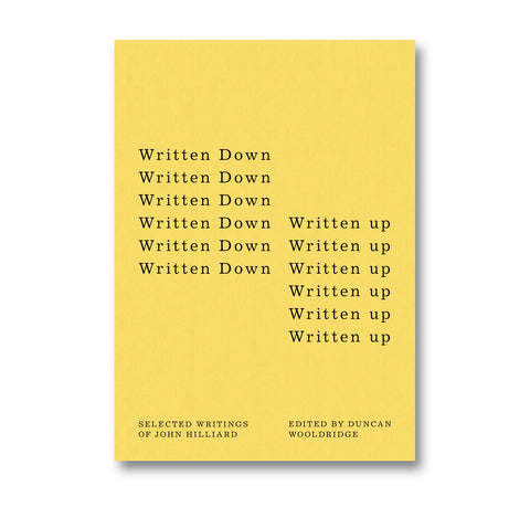 Cover of "Written Down / Written Up: Selected Writings of John Hilliard" by MACK, featuring a minimalist yellow design with text.