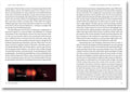 Cover of "Written Down / Written Up" by John Hilliard, published by MACK, featuring text and artwork on a minimalist background.