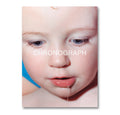 Book cover for Chronograph with a close-up of a dribbling hild's face