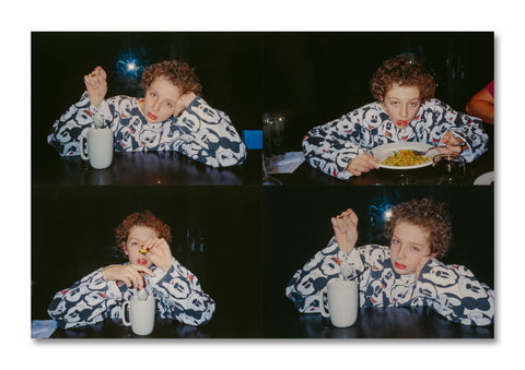 Photograph of a SPBH Editions chronograph photography book titled NH-FAMILY_BOOK with a minimalist cover design.