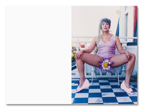 Open photography book titled "Positions" by MACK, showing pages with photographic images and text on a white background.