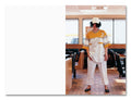 Person wearing a yellow and white outfit in a casual setting