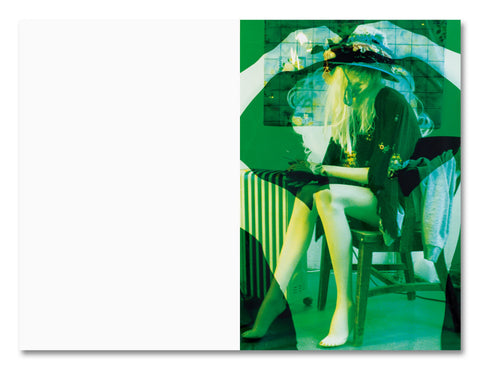 Open photography book titled "Positions" by MACK, featuring minimalist text and creative layout on a white background.