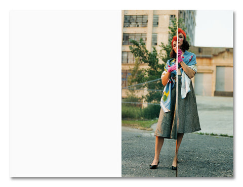 Open photography book titled "Positions" by MACK, showcasing vibrant images and creative layouts on a clean white background.