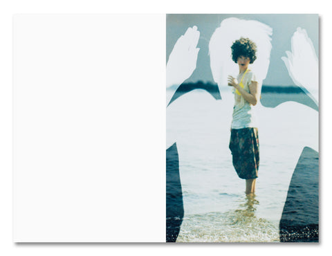 Open photography book titled "Positions" by MACK showing minimalist text and visual sequences on a clean white background.