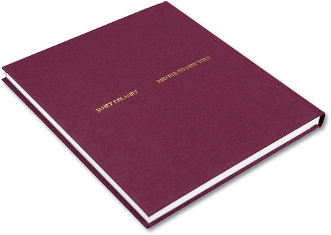 Close-up of the cover of the rare book "Red Eye to New York" by MACK, showcasing its detailed design and vibrant red color.