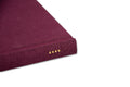 Close-up of the cover of "Red Eye to New York" rare book by MACK, showing detailed red and black design elements.