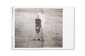 Photograph from the book "Restricted Images," featuring Warlpiri art and imagery, published by SPBH Editions in a photography book.