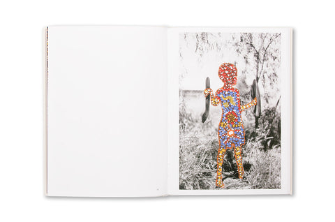 Photograph from "Restricted Images" photography book by SPBH Editions showcasing Warlpiri Central Australian artwork and cultural imagery.