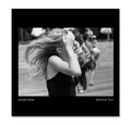 Cover of 'American Teen' by Joseph Szabo. Uses an image of a young woman holding her forehad while in movement