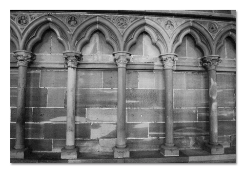 Photograph of classical columns in black and white