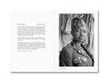 Open photography book "Faces and Phases" by MACK displaying a two-page spread with black-and-white portraits and artistic layouts.