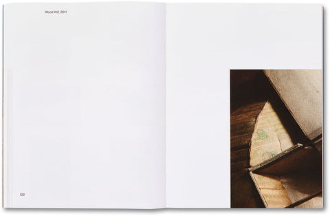 Open art book from House of Card series by MACK, showcasing colorful abstract illustrations on glossy pages.