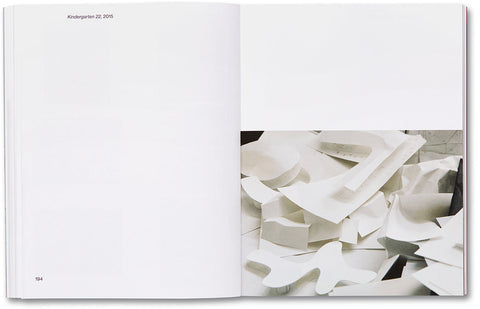 Open art book titled House of Card by MACK featuring vibrant colorful illustrations on glossy pages.