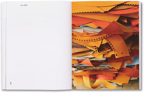 Open art book titled House of Card by MACK featuring intricate card-themed illustrations on glossy pages