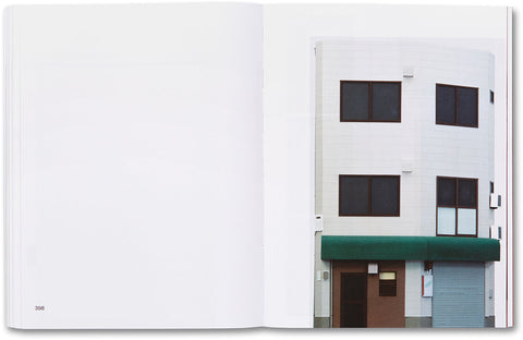 Open art book by MACK titled House of Card featuring detailed illustrations and creative card-themed artwork.