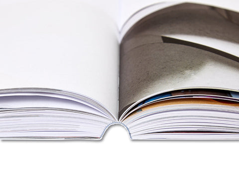 Open art book from House of Card series by MACK featuring intricate card illustrations and vibrant artwork pages.